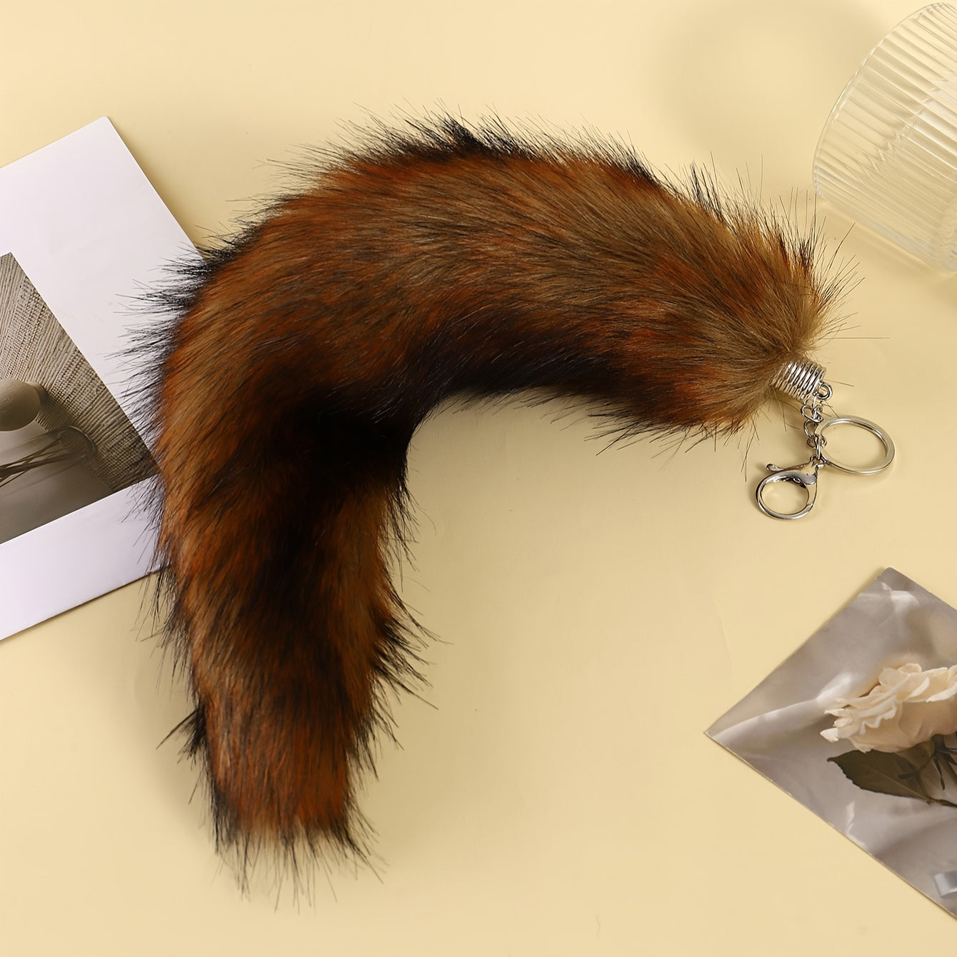 Large Faux Fox Tail Keychain for Women, made with Flannelette Fur and designed as a Carry Bag Keyring. This Novelty Fashion Accessory features a Lobster Claw Closure and is a Decorative Keyring perfect for Birthday Gifts.