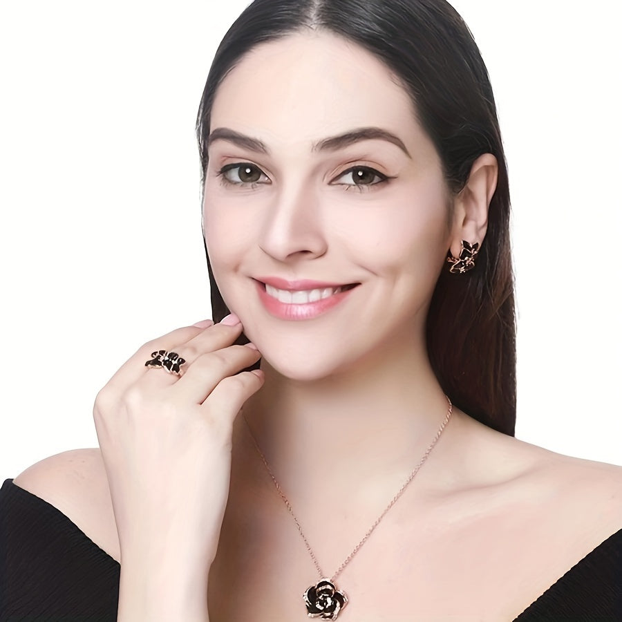 Complete your daily outfits with this stylish jewelry set featuring earrings, a necklace, and a ring. Crafted in 14k gold-plated metal, each piece showcases a sparkling flower design that will surely elevate your party accessories.