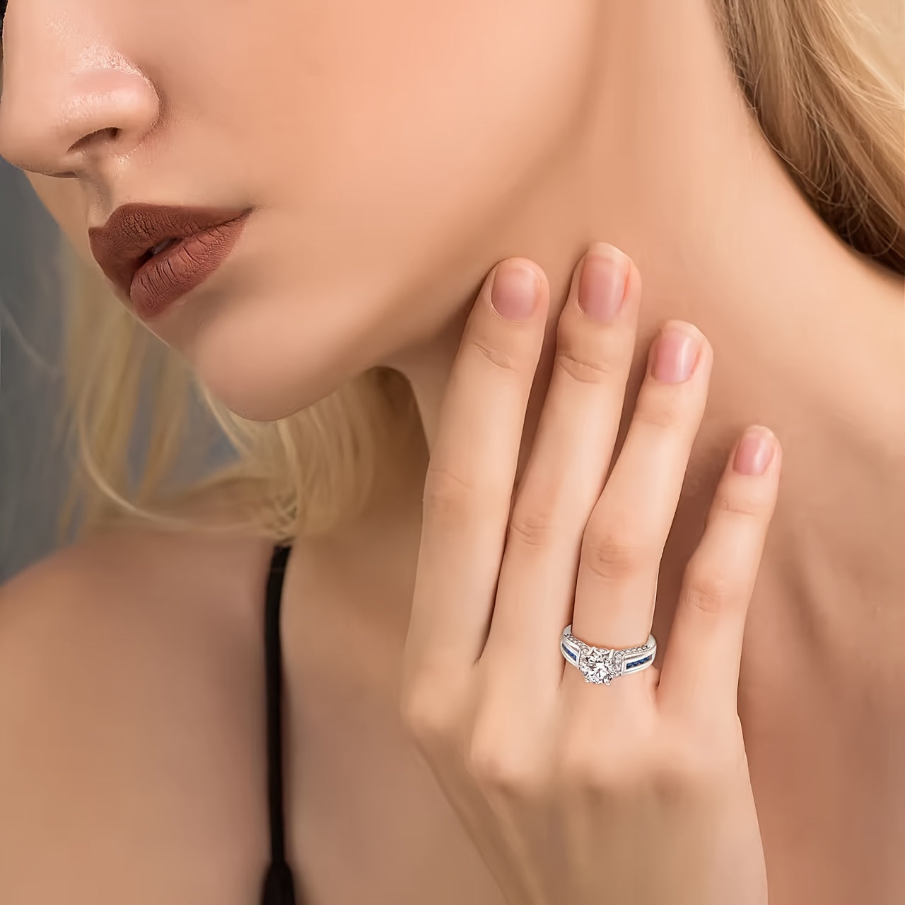 Beautiful 2ct Moissanite Engagement Ring adorned with stunning Blue Side Stones, crafted in 925 Sterling Silver Plating. This Boho Royal Style ring is ideal for both daily wear and special festival celebrations, making it a wonderful Mardi Gras gift.