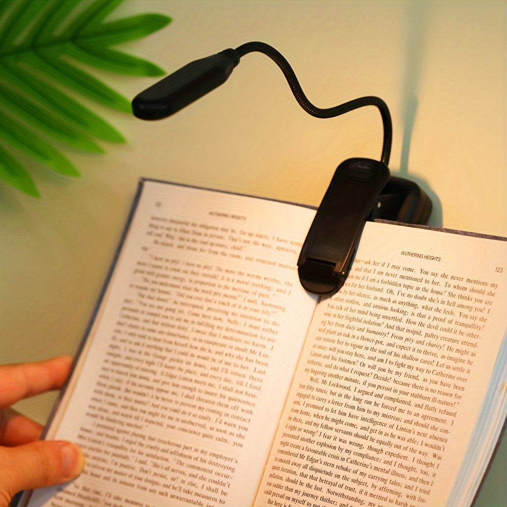 Adjustable arm reading light with yellow light, portable battery-powered LED night light with clip for reading, desktop eye protection lamp for reading.