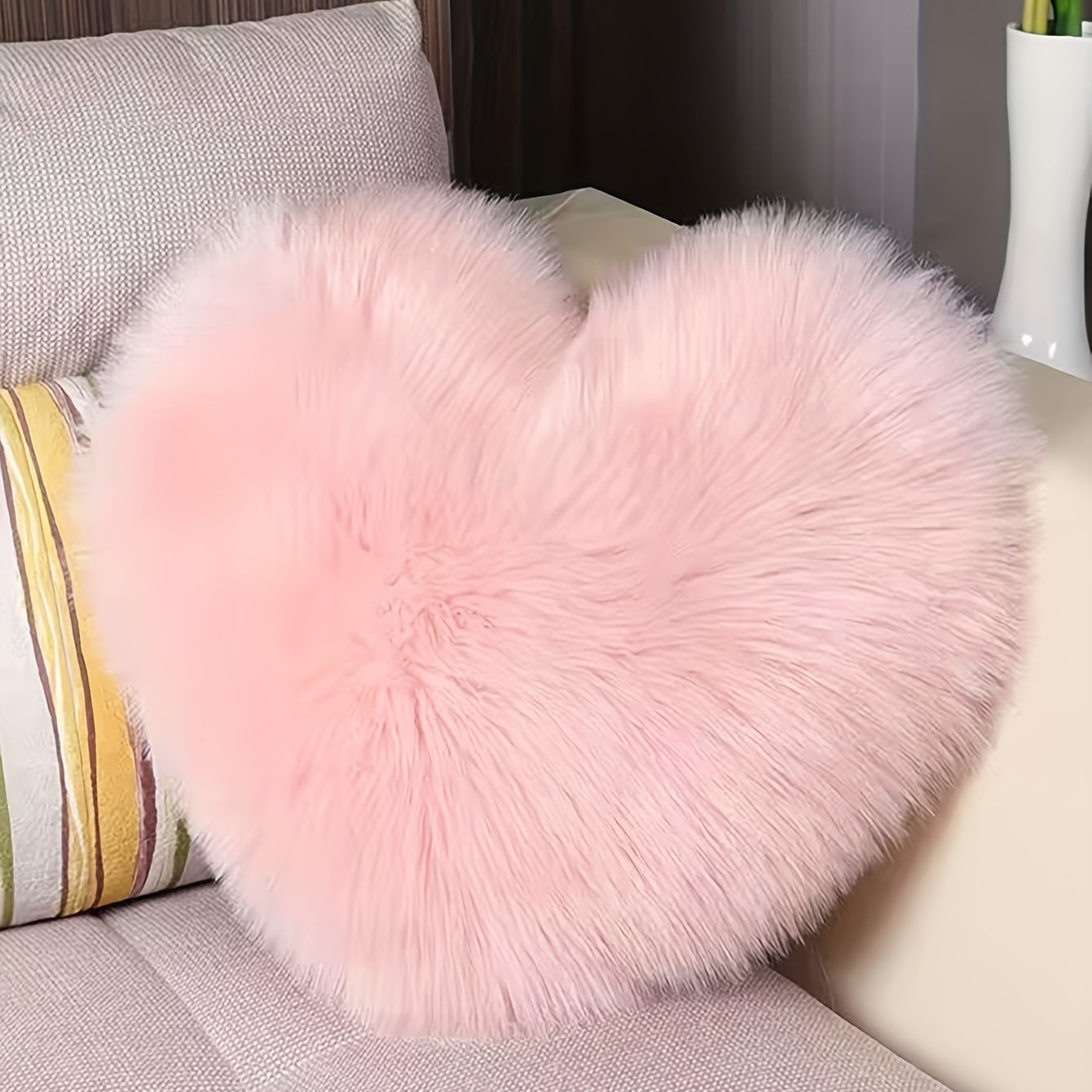 Soft and cozy pink heart pillowcase for living room, sofa, and bedroom, adding romance and comfort to your home decor.