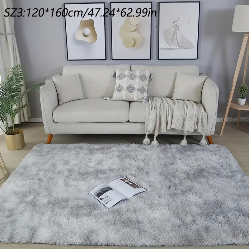 A stylish light grey tie-dye gradient plush carpet perfect for your living room, coffee table, or bedside. This long-haired washable mat is ideal for adding a touch of Nordic style to your bedroom.