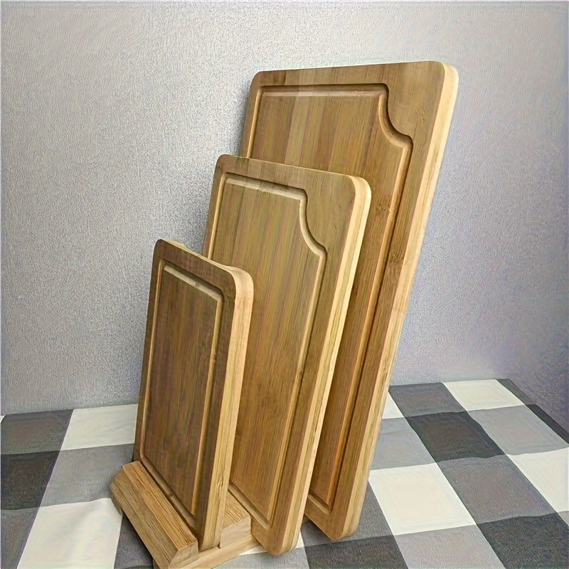 A collection of kitchen cutting boards made from high-quality wood, including bamboo. This set includes three cutting boards with juice grooves, perfect for preparing meats, fruits, and vegetables. Also included are serving boards with easy-to-grip