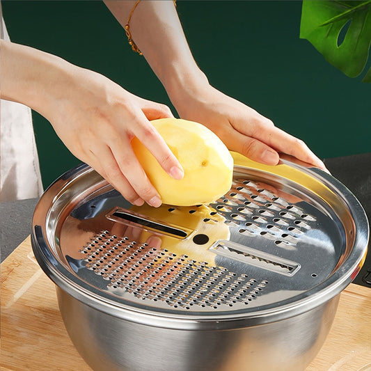 This stainless steel vegetable slicer and grater is compatible with containers measuring 26.01cm and 27.94cm. It is ideal for slicing and grating fruits and vegetables, making it a convenient and dishwasher-safe kitchen tool.