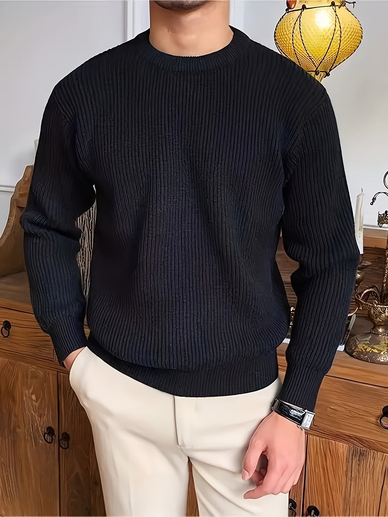 Men's black cotton-blend crew neck sweater with soft ribbed texture, perfect for fall/winter warmth in a casual attire.