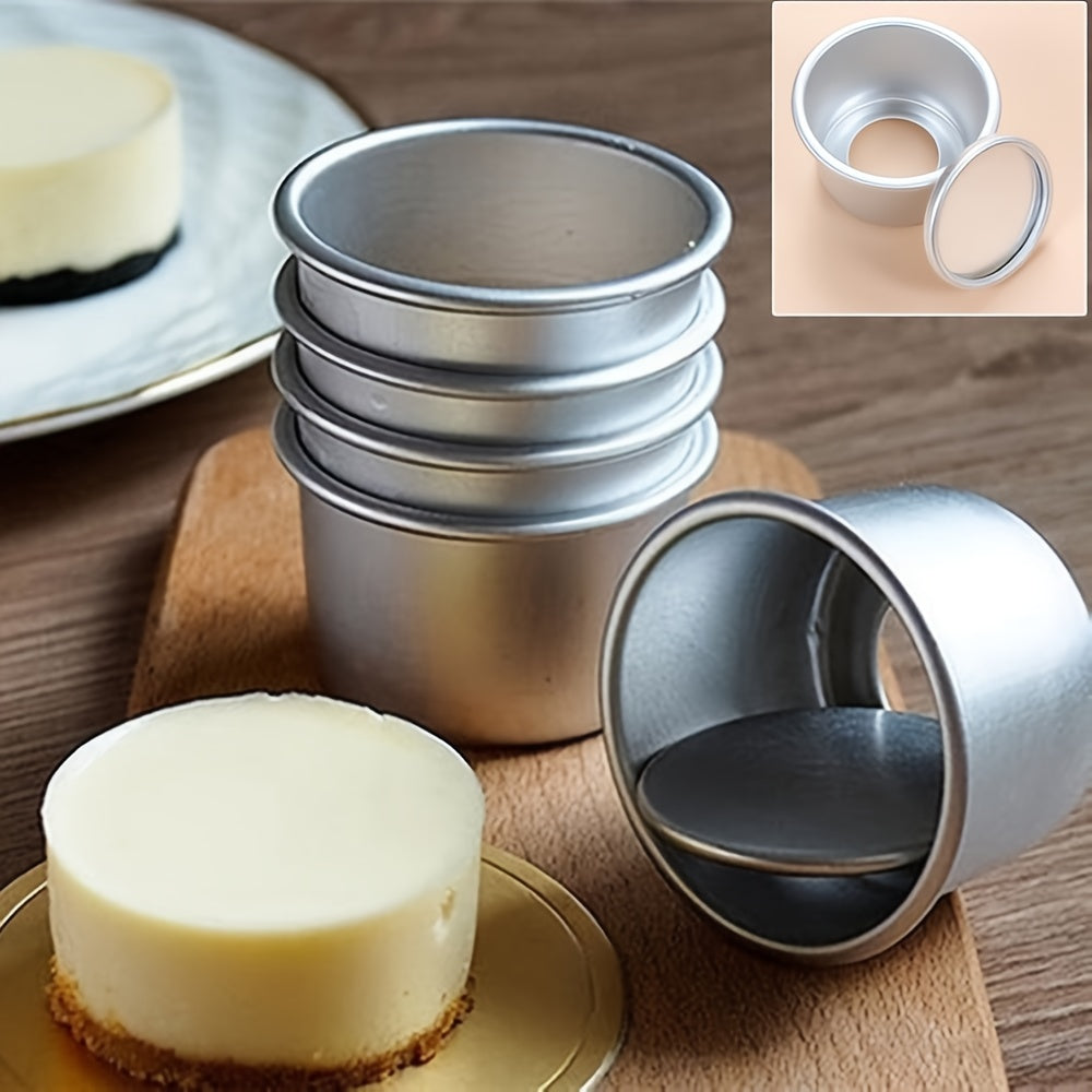 A tiny 2-inch mini aluminum golden round cake mold with removable bottom and thickened anodized base for baking DIY cakes.