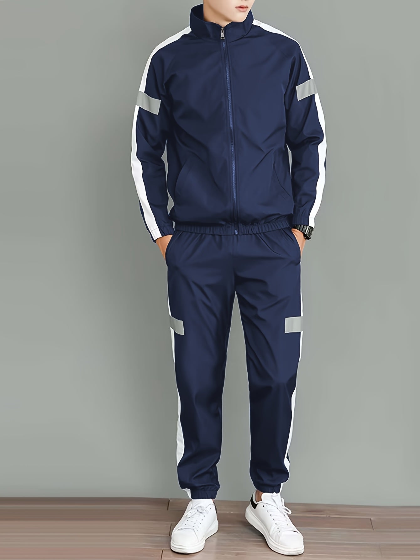 Stylish men's casual set with jacket and loose pants, ideal for spring and autumn activities.