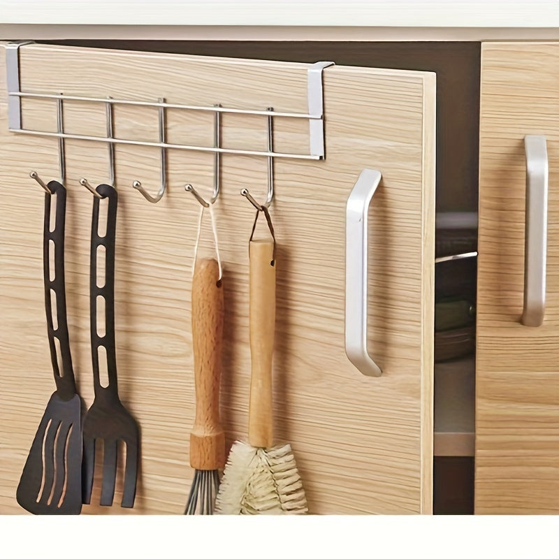 This Stainless Steel Hook Rack features 5 hooks, perfect for hanging behind doors, on cabinet doors, or on walls. Made of durable stainless steel, it is versatile and can be used for hanging towels behind living room doors or clothes in bedrooms. It is