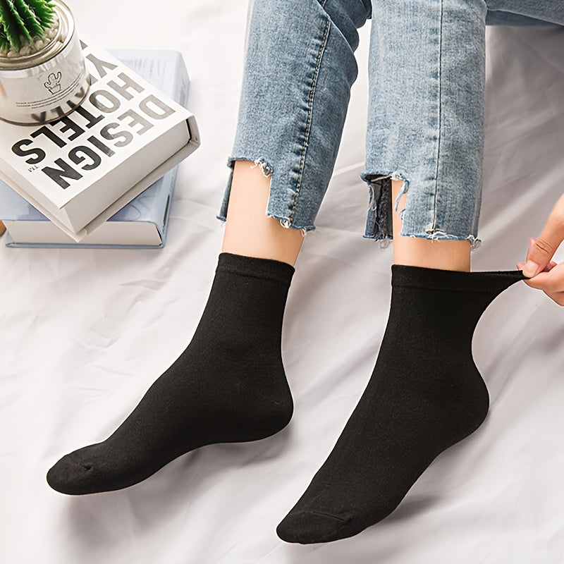 5 pairs of plain black thin and breathable women's socks.