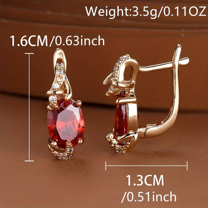 Trendy women's earrings featuring blue, white, red, and pink stones in round and oval cuts. These anniversary claw earrings are plated with 18K gold. Perfect for adding a pop of color to any outfit.