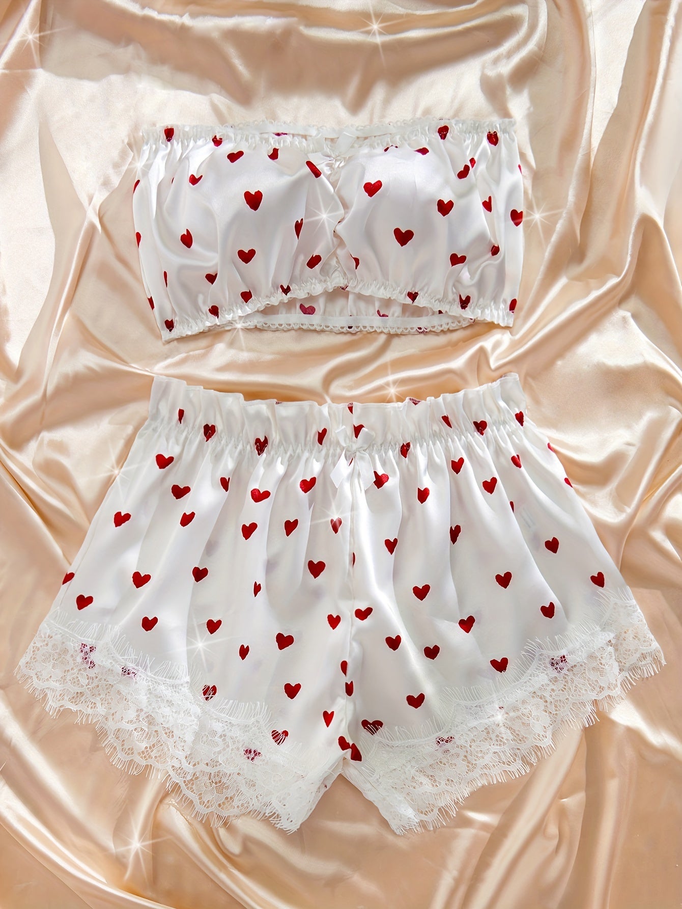 Sexy lingerie set featuring heart print bowknot details with high waist shorts and elastic bra.