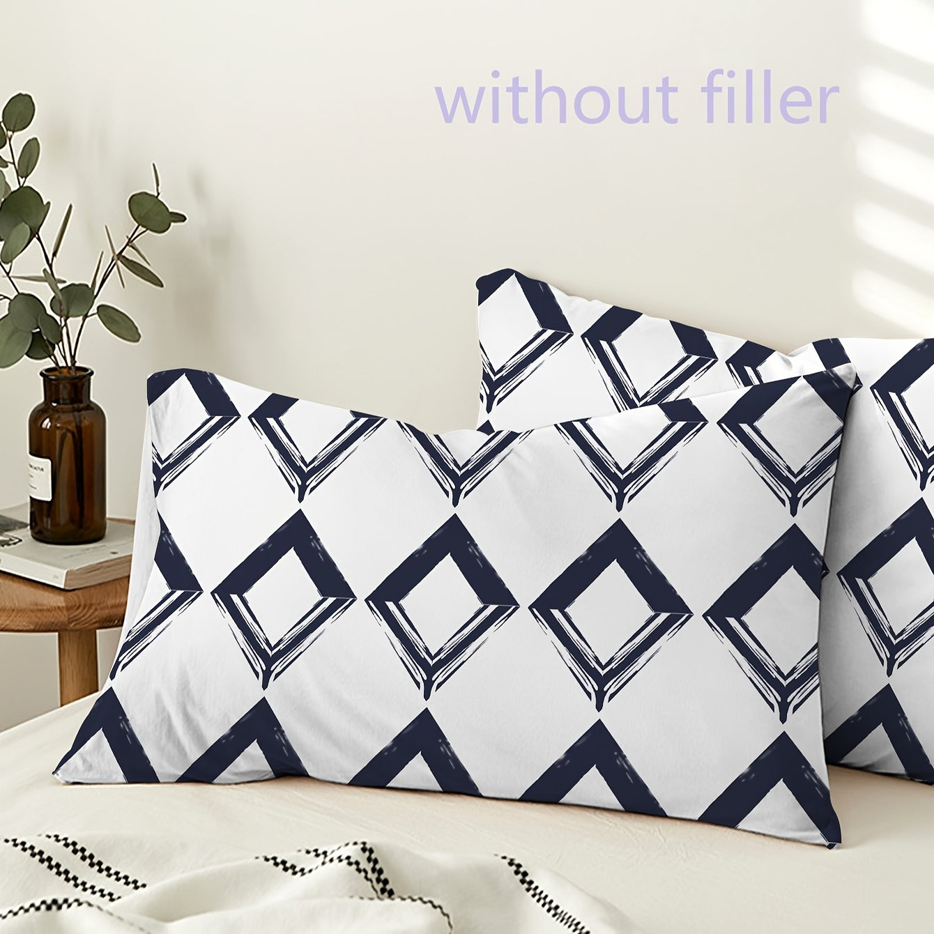 Two soft and breathable pillowcases featuring a geometric print design. Made from brushed polyester with an envelope closure, perfect for bedroom and sofa decor. These pillowcases are also machine washable.