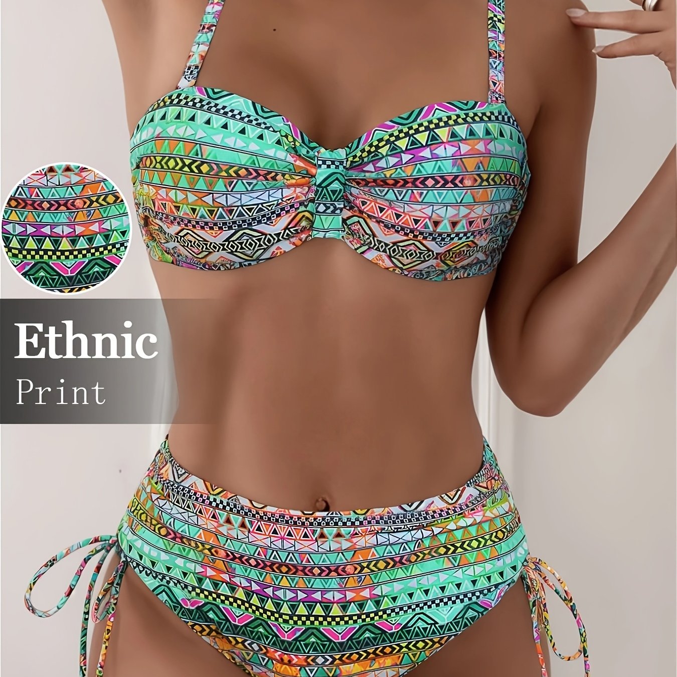 Two-piece set featuring vibrant printed pants with drawstring design and matching swimsuit.