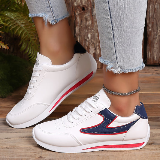 Women's flat lace-up sneakers for outdoor casual wear, comfortable low top shoes.