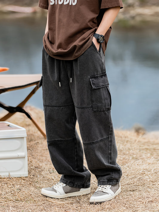 Men's cargo pants with multiple pockets and drawstring, ideal for outdoor activities in spring and fall.