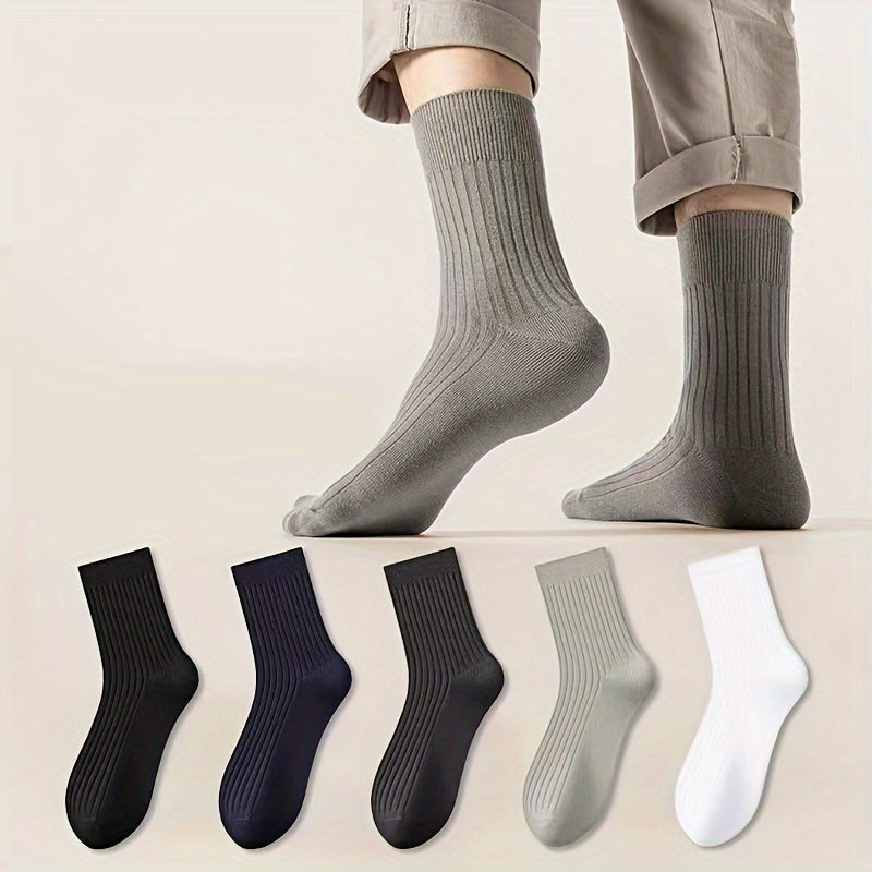 Men's solid color socks in a multi-pack of 2 or 5 pairs, breathable mid-calf sports socks suitable for all seasons. Trendy and boneless design.