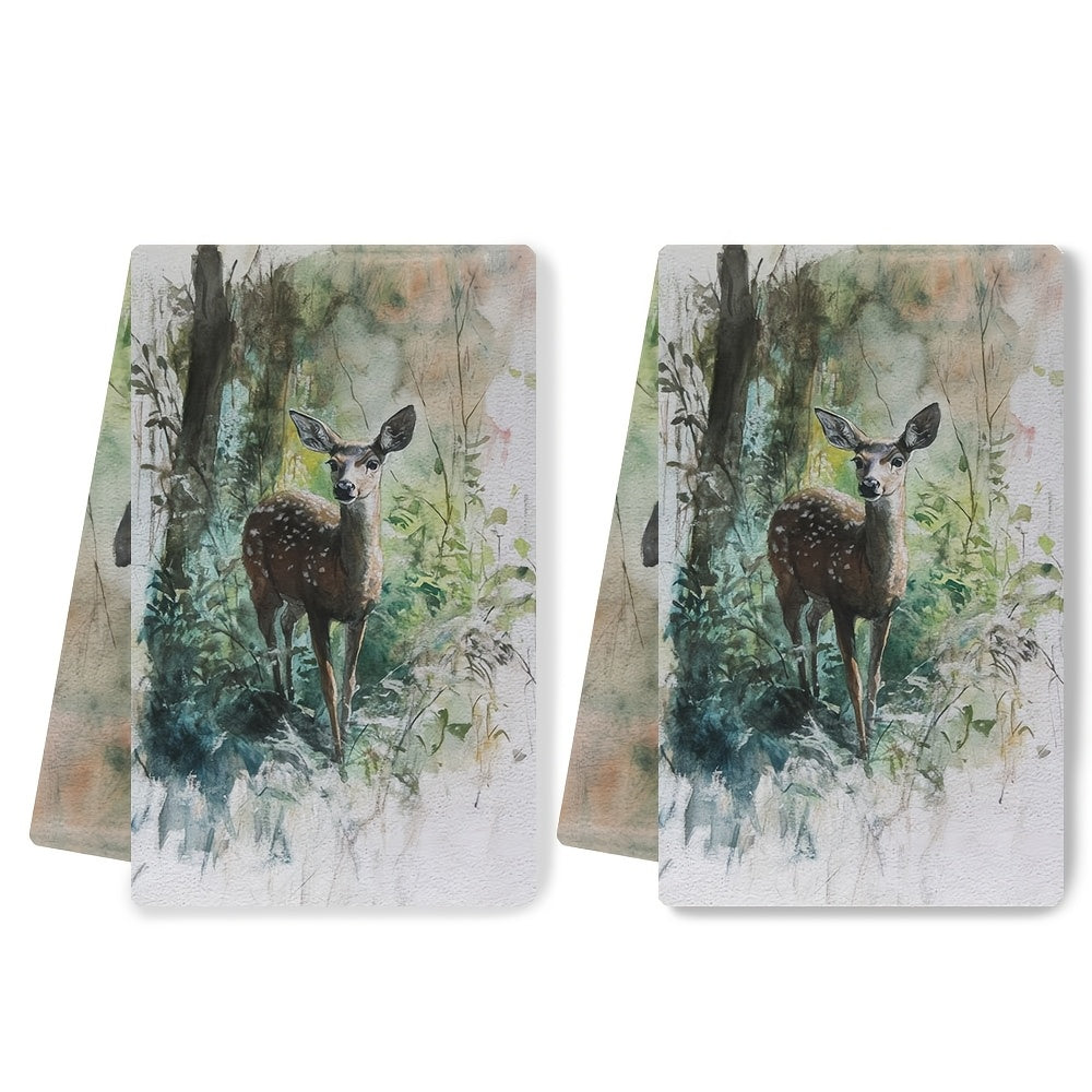 Two pieces of ultra soft kitchen towels featuring a graceful deer in underbrush design. These highly absorbent and machine washable dish hand towels are designed in a contemporary watercolor style, measuring 40.64x60.96 cm. Perfect for holiday decor and