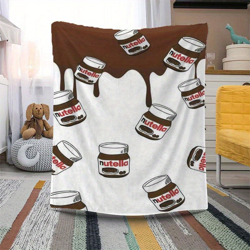 Stay warm and cozy with our Nutella Print Flannel Fleece Blanket! This blanket features a mixed color design and is made of polyester with a digital print. Perfect for all seasons, this charming anime-themed blanket is ideal for use in the home, kitchen