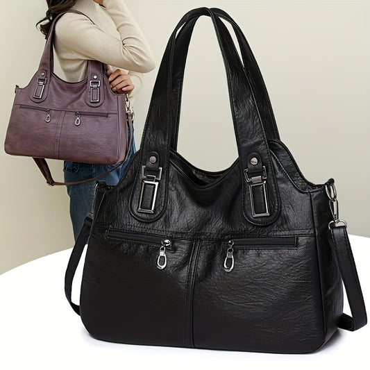 Stylish women's crossbody bag with multiple pockets, detachable strap, chic design, zip closure, and polyester lining.