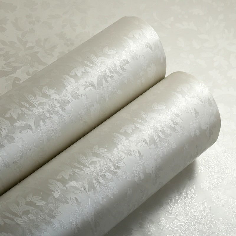 2 rolls of thick waterproof self-adhesive PVC wallpaper with European floral design on a cream background and delicate leaf patterns. Reusable for living room and bedroom decor.