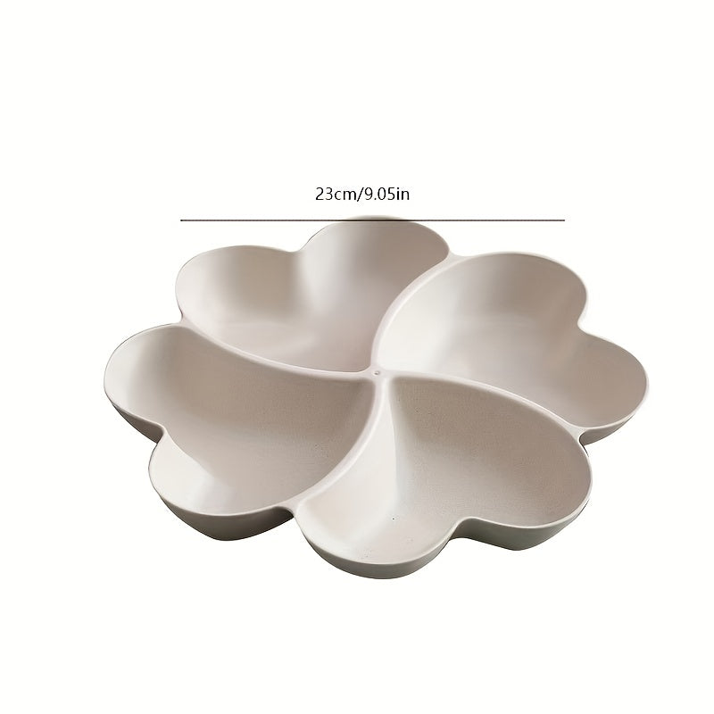 Heart-shaped divided fruit plate for home or party use, also suitable as a dessert plate or snack tray.