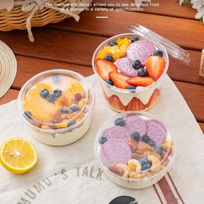 25 sets of clear plastic dessert cups with lids made from PET material, designed for reuse. These round candy packaging boxes are perfect for cakes, sweets, and fruit. They are transparent food containers suitable for both home and party use.