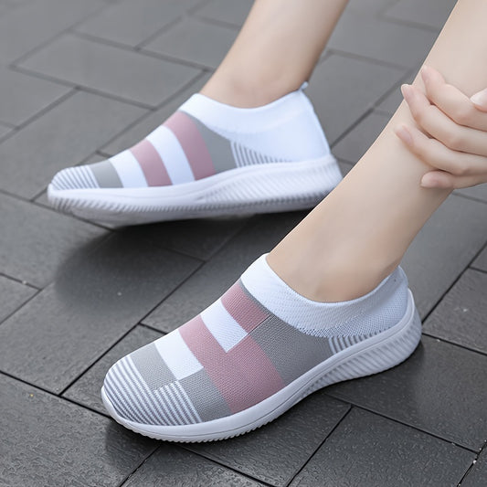 Breathable mesh slip-on sneakers for plus size women in pink, gray, and white plaid with soft sole and round toe design, suitable for all seasons.