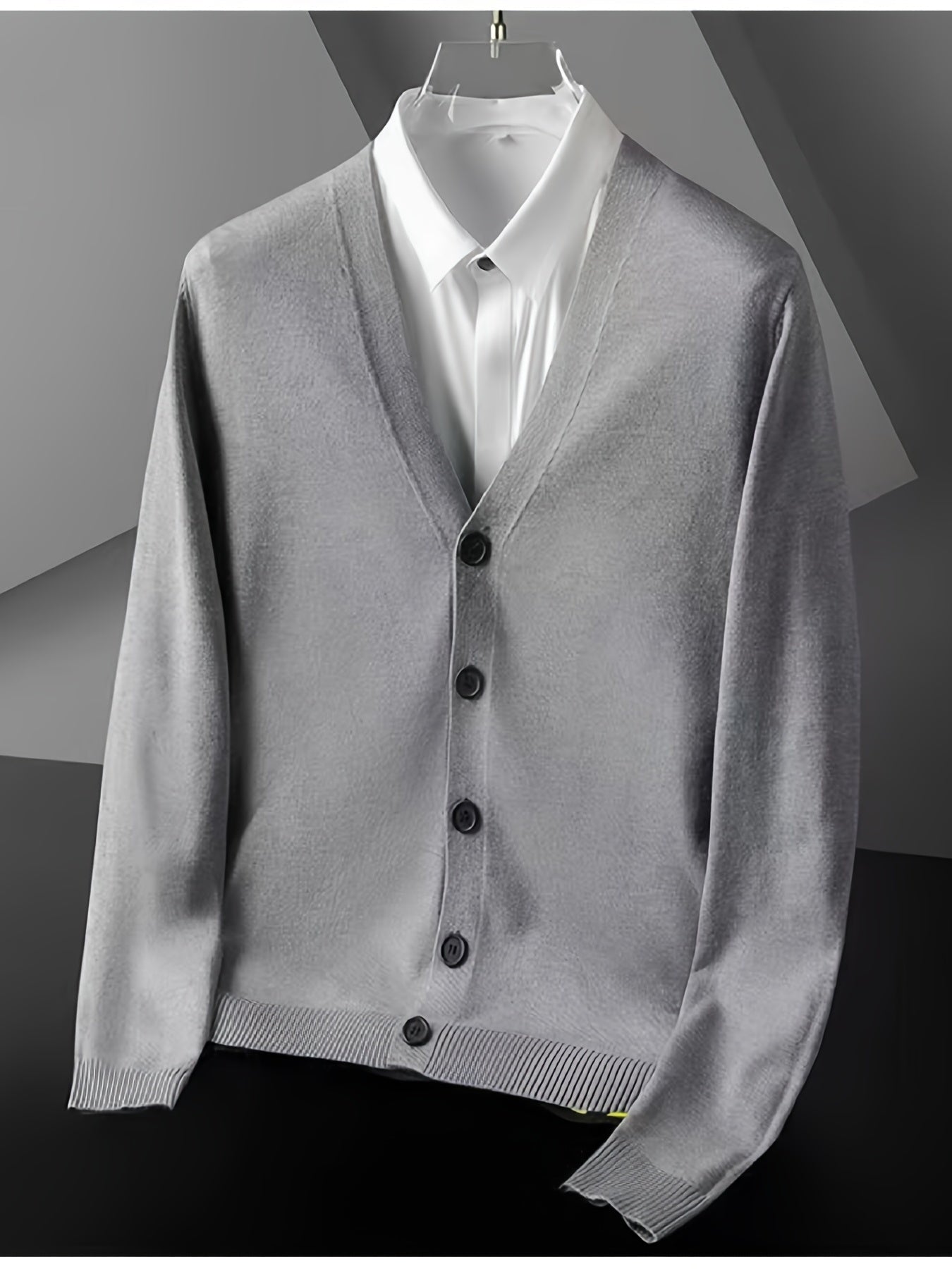 Men's plus size V-Neck cardigan made of viscose blend knit with rib-knit details, long sleeves, and button placket. Perfect for spring/fall, semiformal occasions. Stylish, ribbed edges.