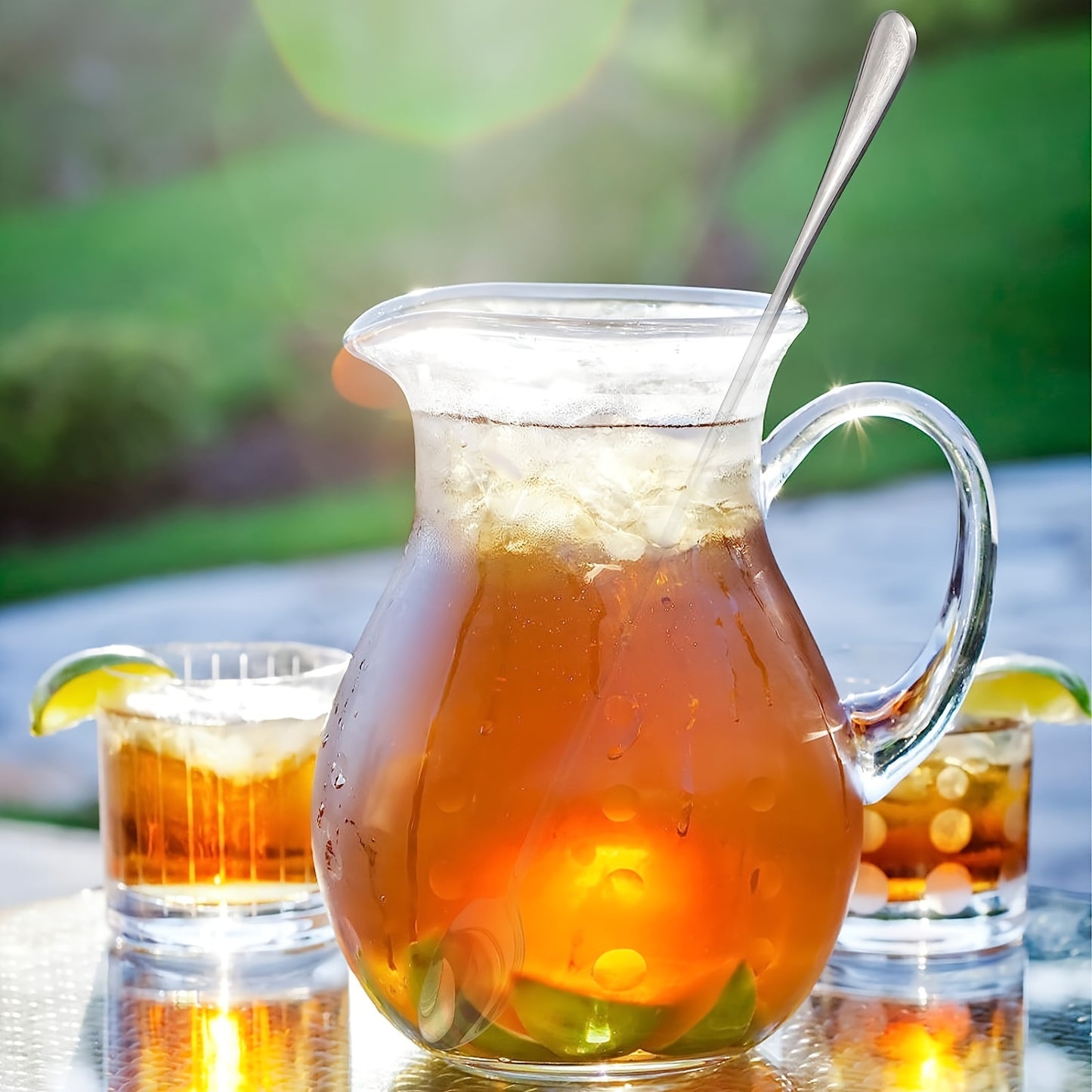 Set of 2 long-handled stainless steel iced tea spoons, perfect for stirring drinks in various settings. Dishwasher safe with a mirror finish.