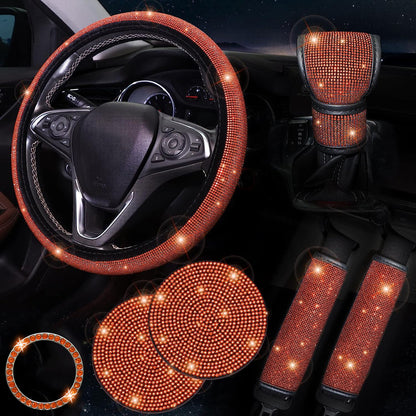 Women's bling car accessories: steering wheel cover, coasters, seat belt shoulder pads, ring sticker, and gear shift cover.