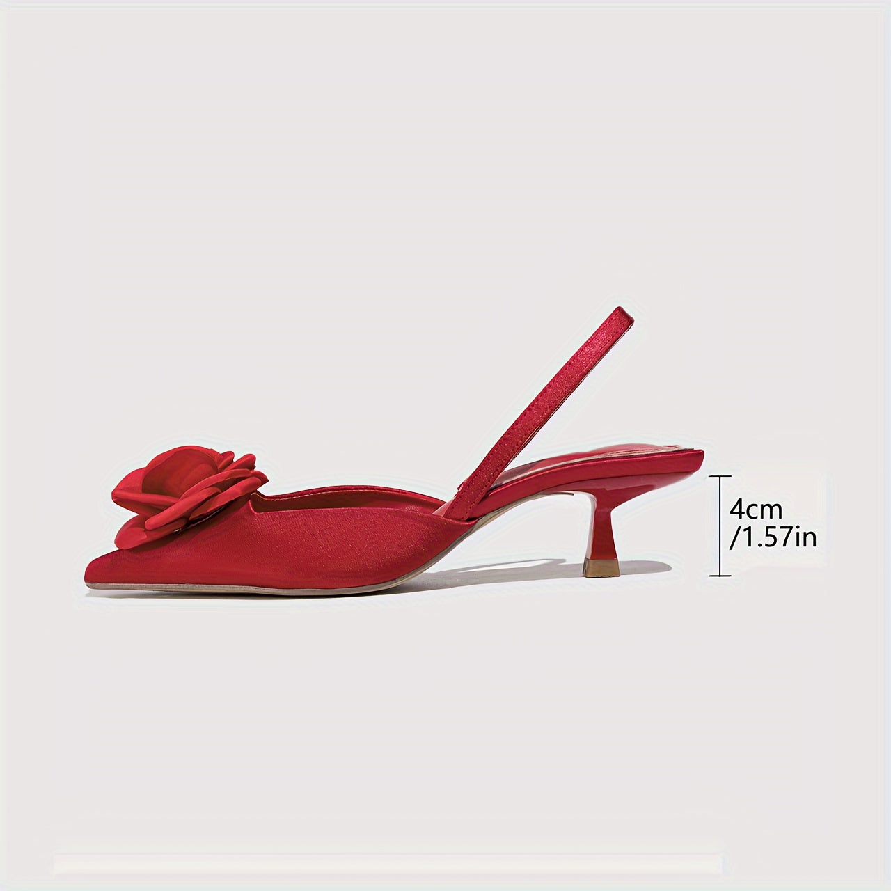 Pointed red high heel shoes with three-dimensional flowers, perfect for night weddings.