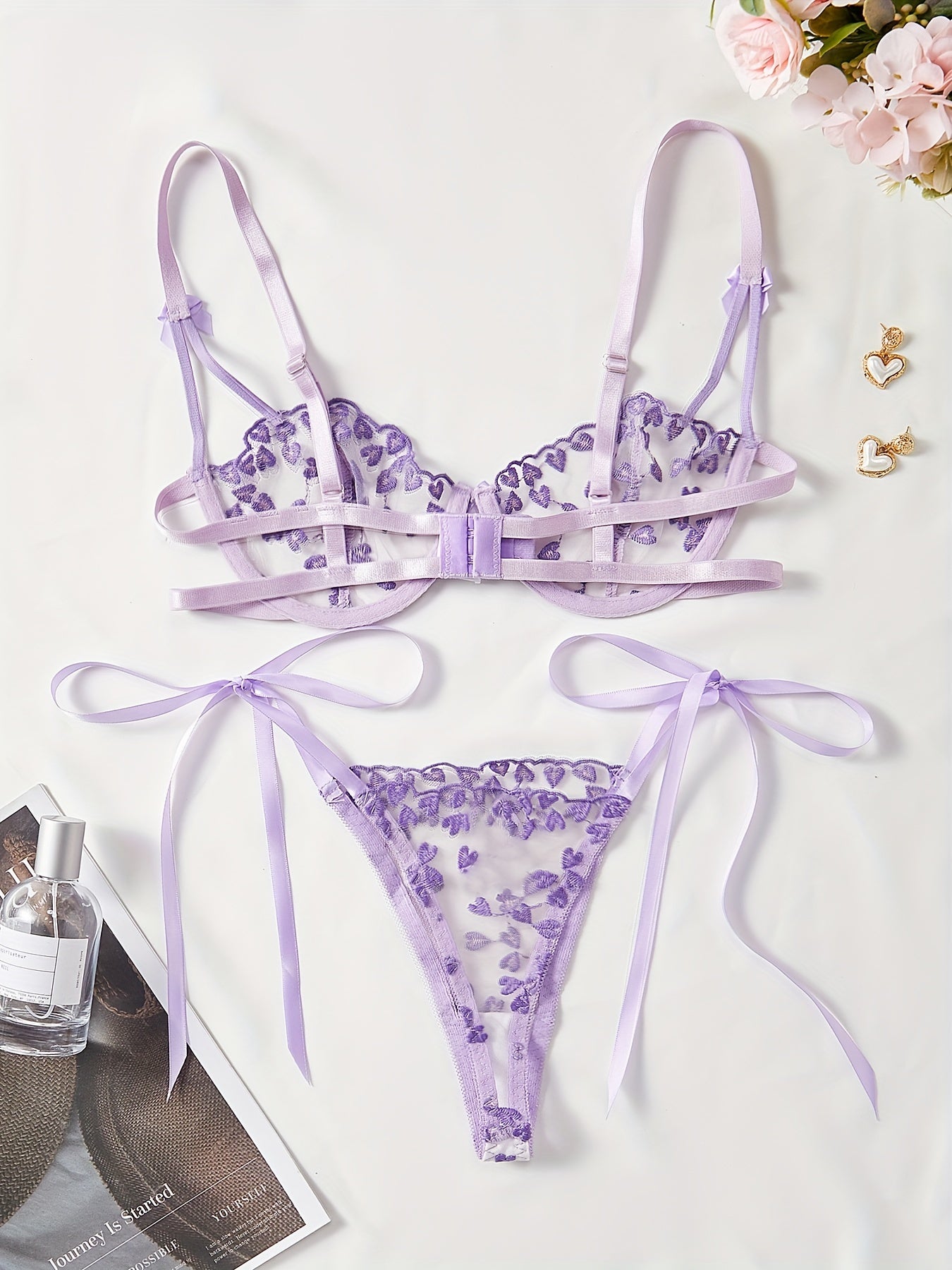 Luxurious adult-sized lingerie set featuring sexy transparent mesh with heart pattern, bow details, and soft ribbons.