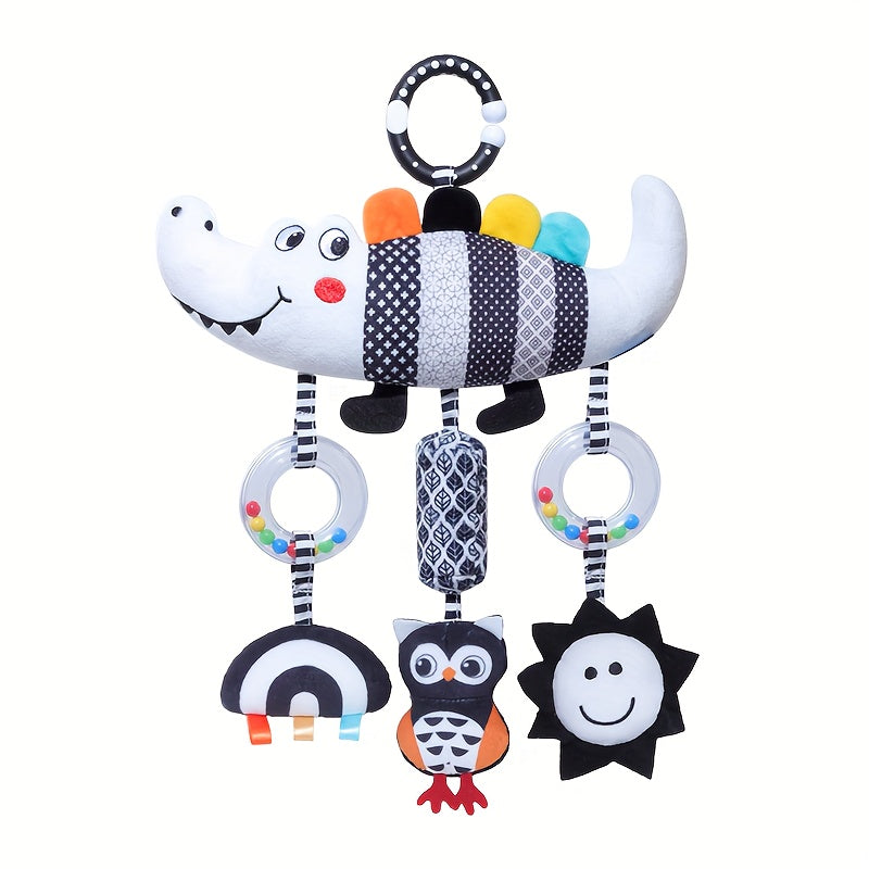 Soft and cuddly black and white animal wind chime plush toys, perfect for baby car seats and strollers. These hanging rattle toys are made of soft cloth and come from the Chinese Mainland. An ideal Christmas gift for infants aged 0-3 years old.