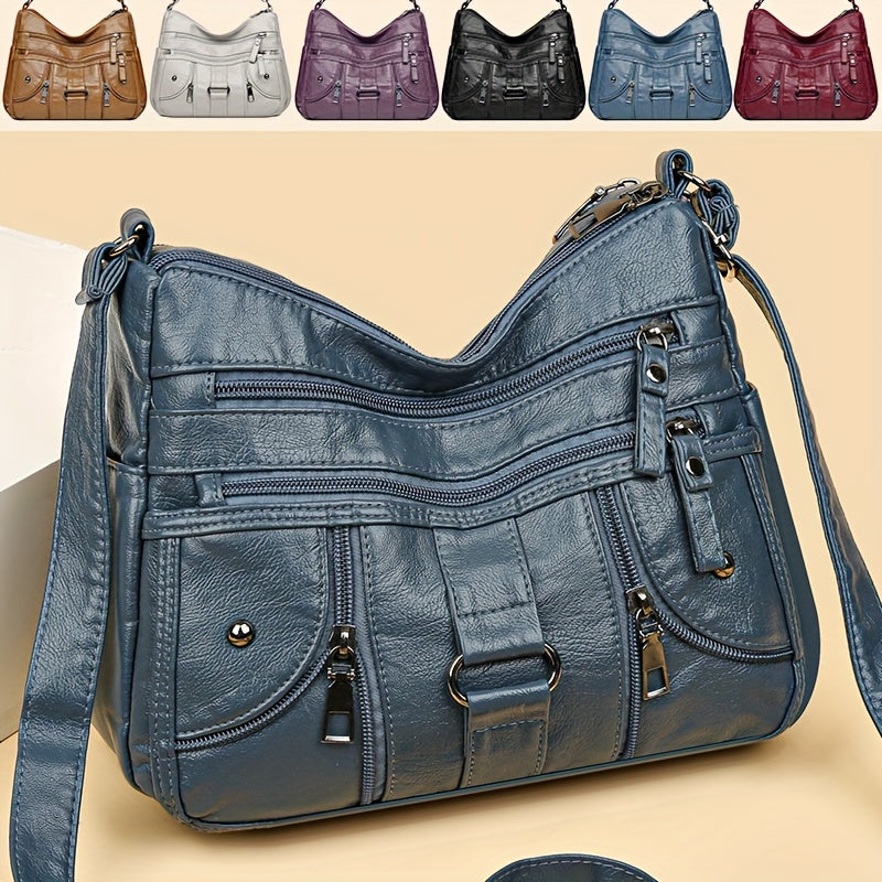 Women's synthetic leather crossbody bag with adjustable strap and anti-theft zipper closure. Large capacity with polyester lining, solid color, and multi-pocket design. Ideal for everyday