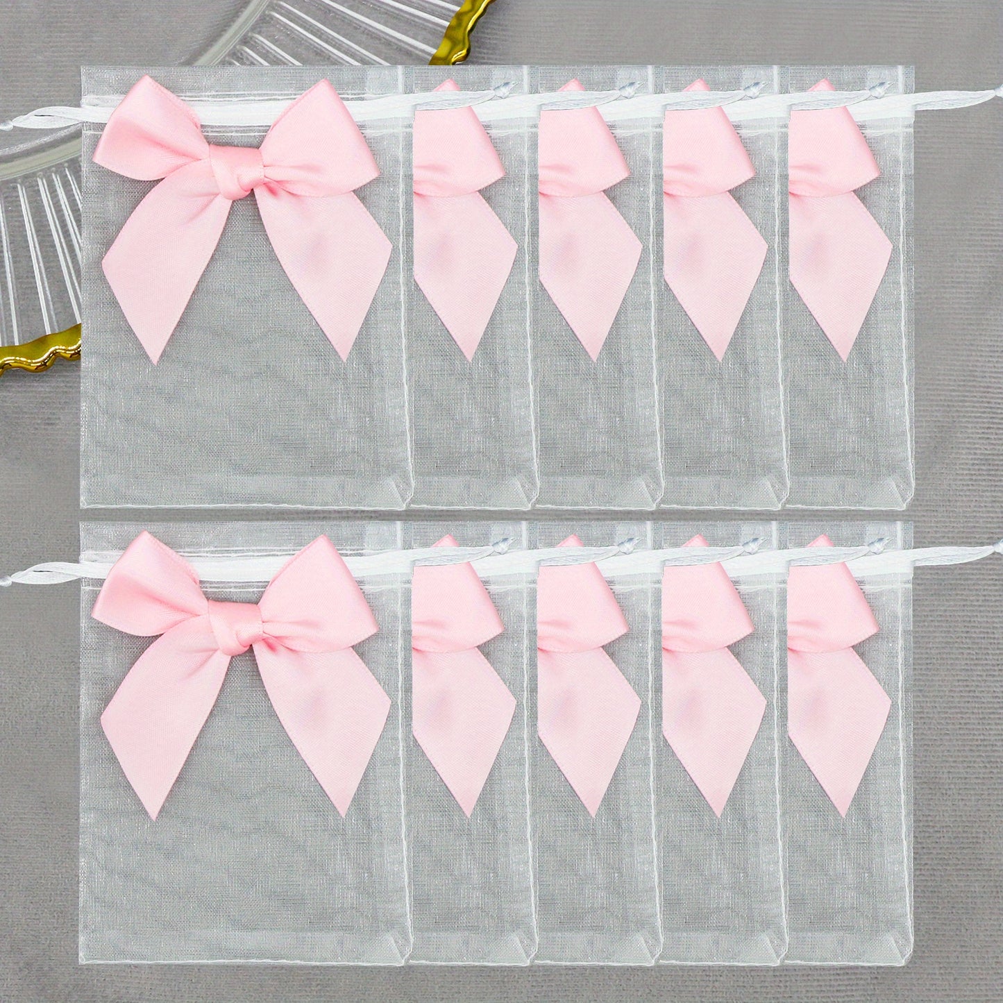 10 elegant organza bags with ribbon and bow, ideal for gift wrapping and party favors.