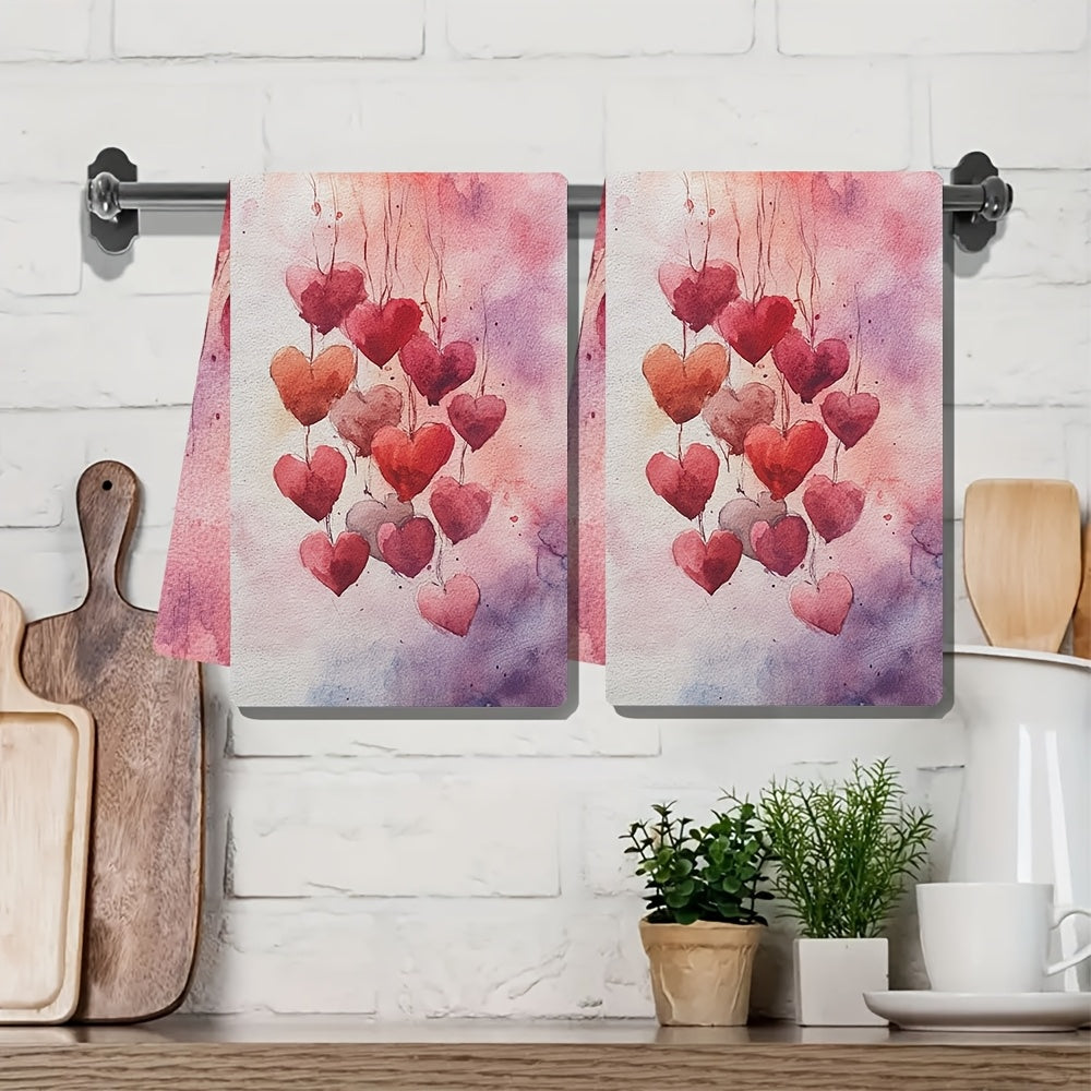 2 pieces of ultra soft kitchen towels featuring a Valentine's Day heart design. These highly absorbent and machine washable dish hand towels showcase romantic pastel hearts with balloons. Each towel measures 40.64x60.96 cm, making them perfect for