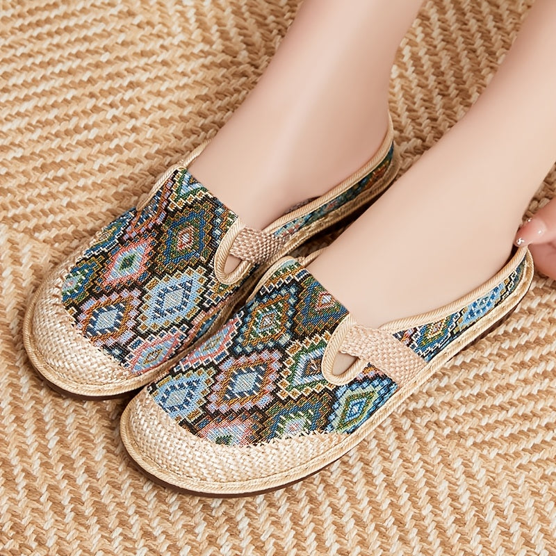 Casual summer slides for women with breathable fabric upper, round toe, strappy back, flat heel, and PU sole, originating from Taizhou and made for North America and Europe.