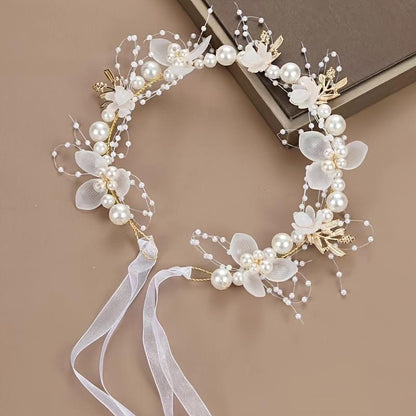 Elegant bridal headband featuring golden leaves, floral wreath, and faux pearls - ideal for weddings & special occasions