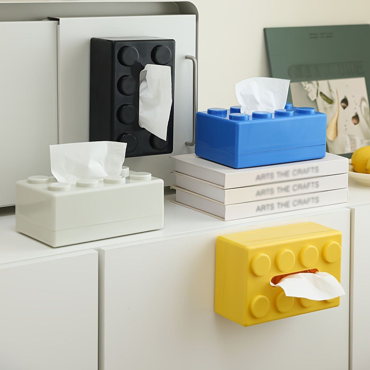 Wall-mounted plastic napkin dispenser doubles as a creative building block tissue holder, making it a multifunctional home dining table storage organizer for Thanksgiving without the need for drilling.