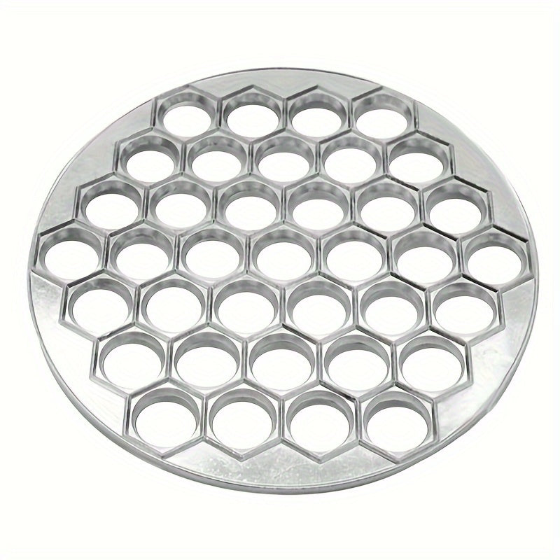 Collection of handy kitchen gadgets comprising of a dumpling maker, dumpling cutter, golden aluminum dumpling mold, tray dumpling cooking mold, and portable outdoor camping tool for effortless transport and convenience during use.