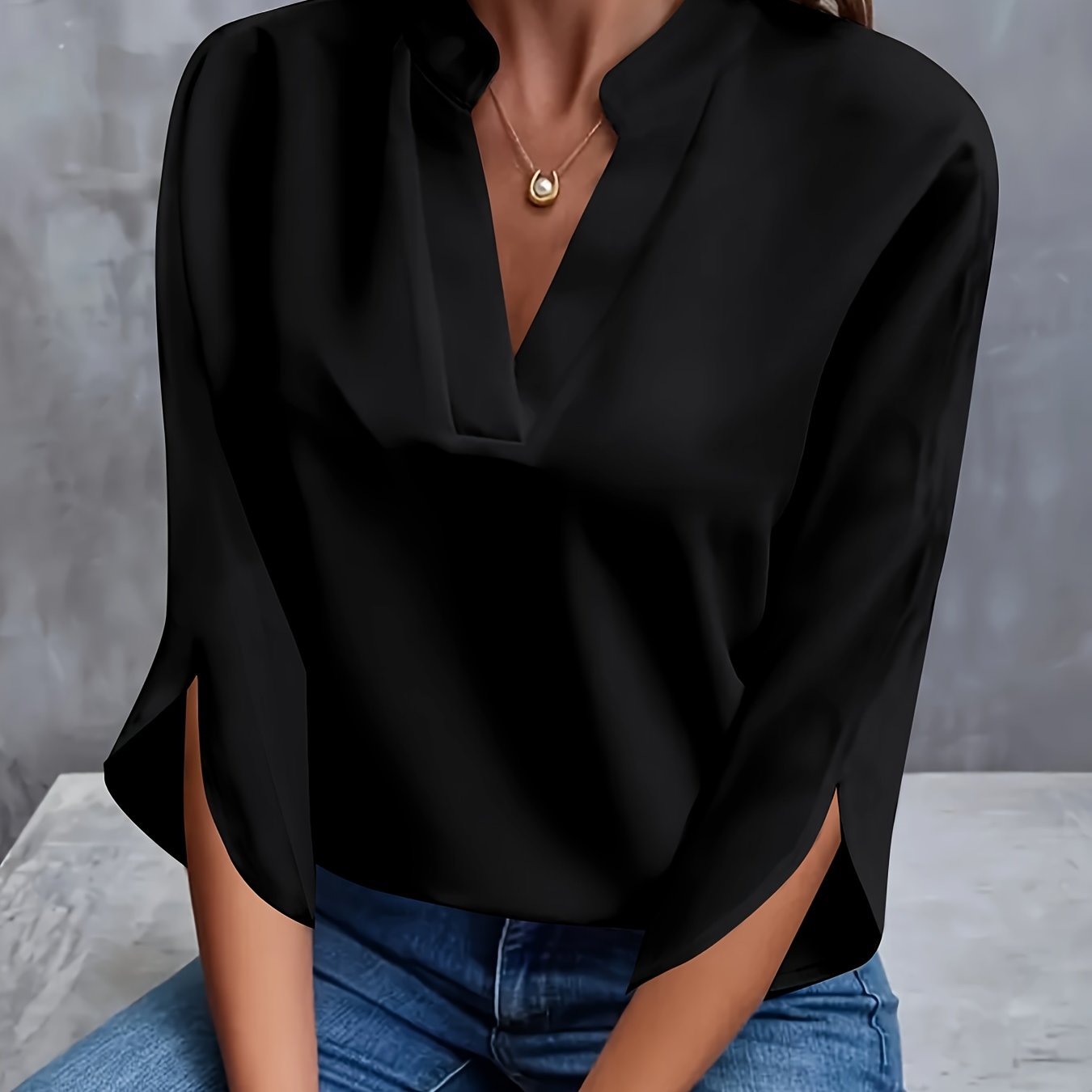 Solid color notch neck blouse with casual 3/4 split sleeves for spring and summer.