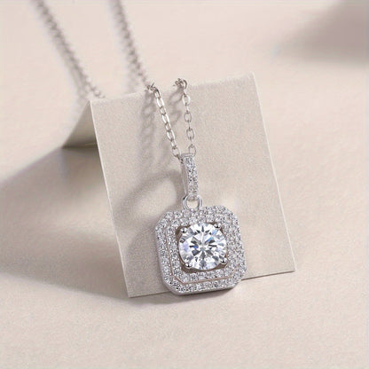 This stylish Moissanite pendant necklace is made of 925 sterling silver and coated with 18K gold, featuring a square halo design. It comes on a collarbone chain and includes a gift box, making it perfect for Valentine's Day, engagements, weddings