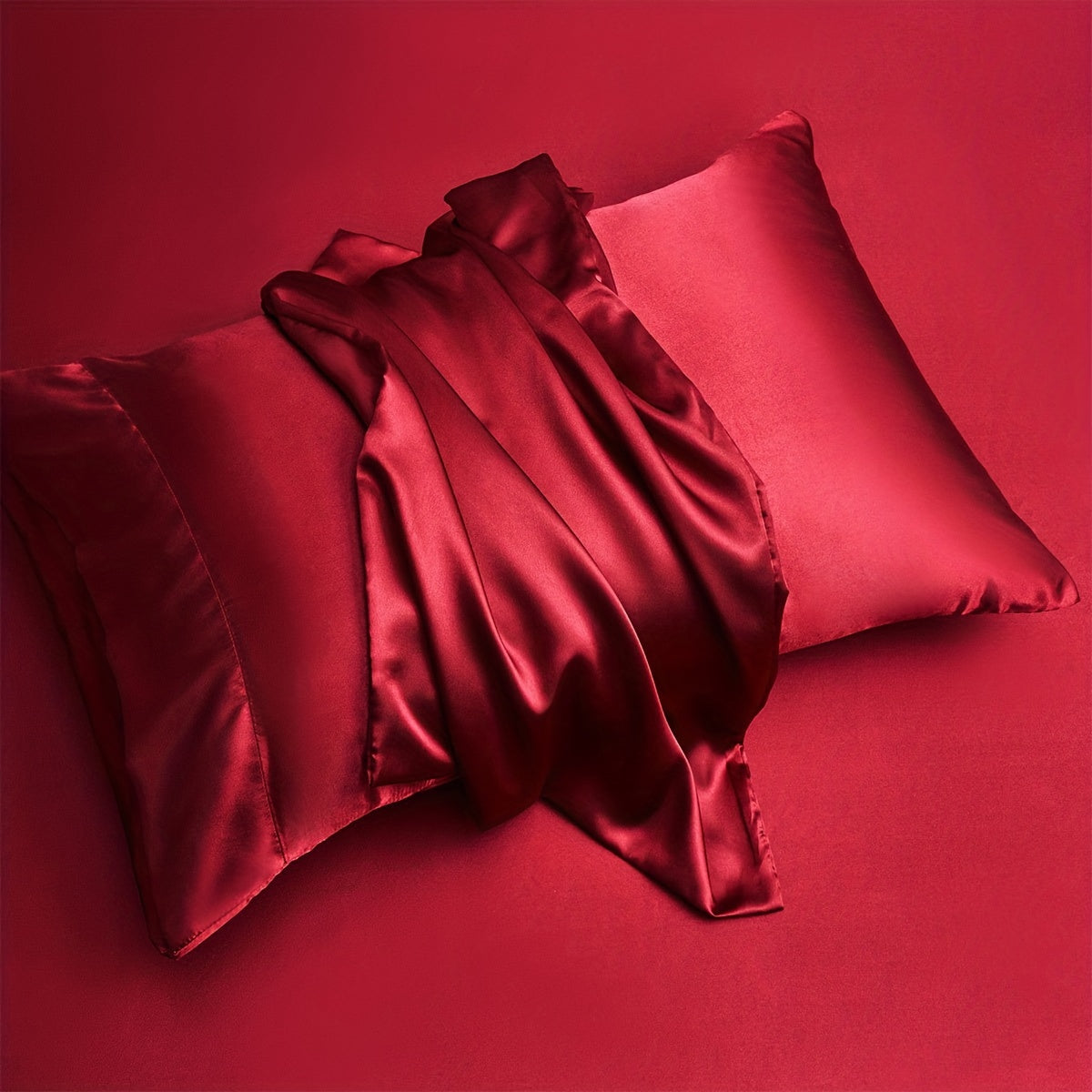 Two pieces of satin pillowcases available in solid colors perfect for the living room or bedroom. Pillow inserts are not included.