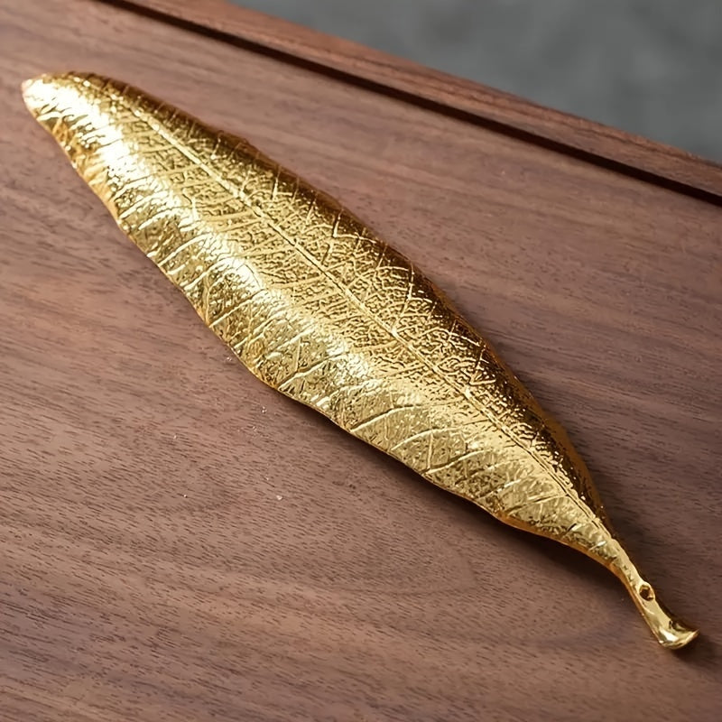 Bodhi Leaf Metal Incense Holder: Elegant unscented stick burner for home fragrance and decor.