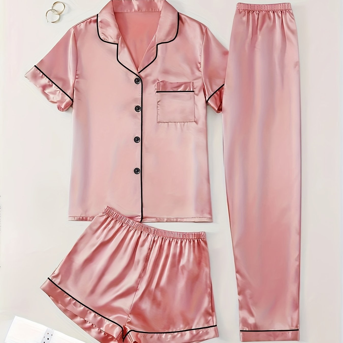 3-piece summer satin pajama set for women featuring collared shirt, long pants, and shorts. Made of 95% polyester and 5% elastane. Available in sizes S-XL.