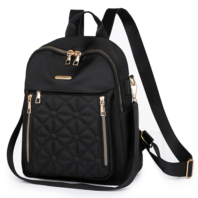 Stylish black nylon backpack for women with tassel detail, adjustable shoulder straps, multiple compartments for travel or daily use. Features durable zipper closure, quilted texture, and