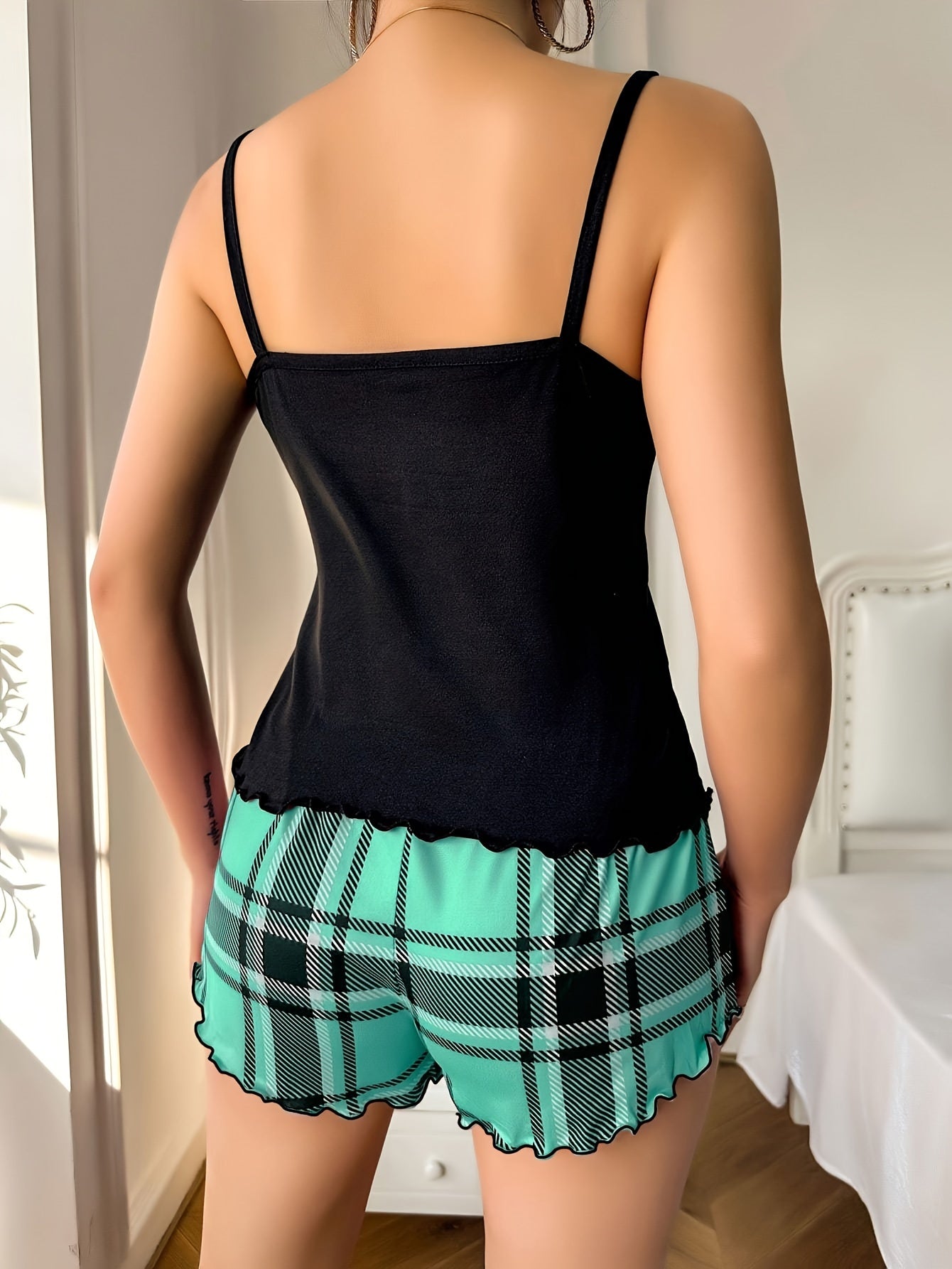 Women's cozy plaid heart pajama set with frill trim, cami top, and shorts for a relaxed summer nightwear look