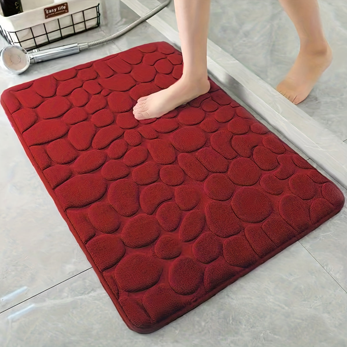 Pamper Your Feet with our Luxurious 3D Pebble Design Bath Rug! This Quick-Dry Non-Slip Bathroom Mat is made of Soft and Comfortable Polyester Memory Foam. It is Woven with a density of 700gsm and is 1.5cm Thick. Perfect for Home Decor and as Holiday