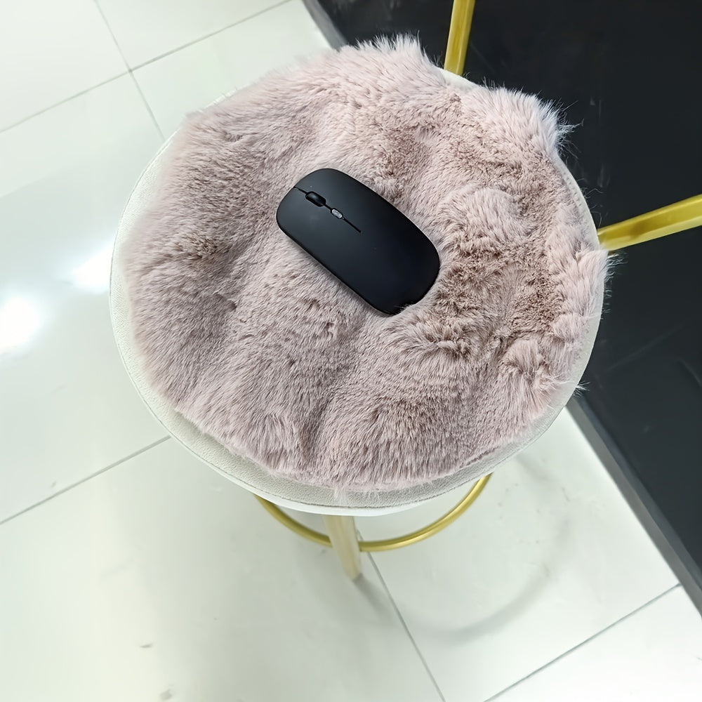 Round plush fabric carpet that is simple, solid, fluffy, soft, and comfortable. This cute indoor decor is easy to clean, furry, warm, and suitable for chair pads, room, bedroom, and indoor use. Made of polyester, it is only suitable for dry cleaning and