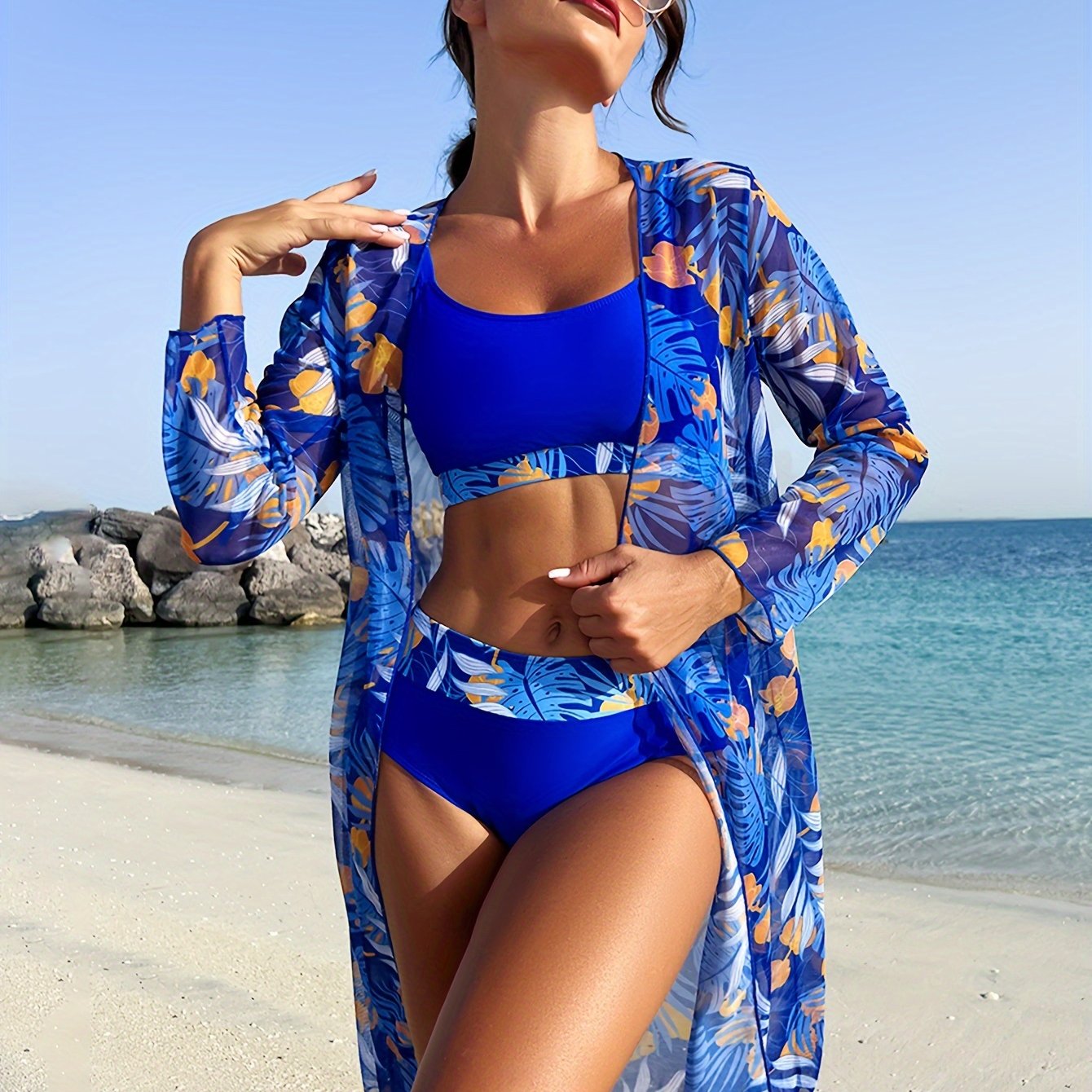 Tropical plant print cover-up set with sun protection for women.